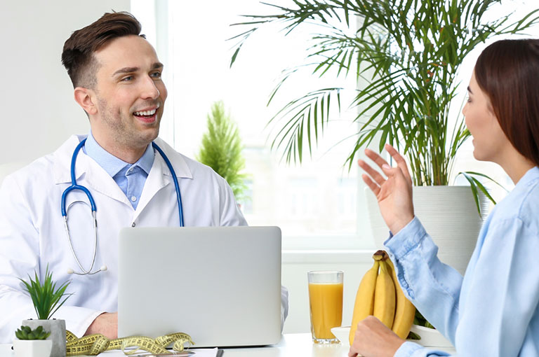Male Doctor Consulting With A Patient On Weight Loss Medication Prescription Ozempic®